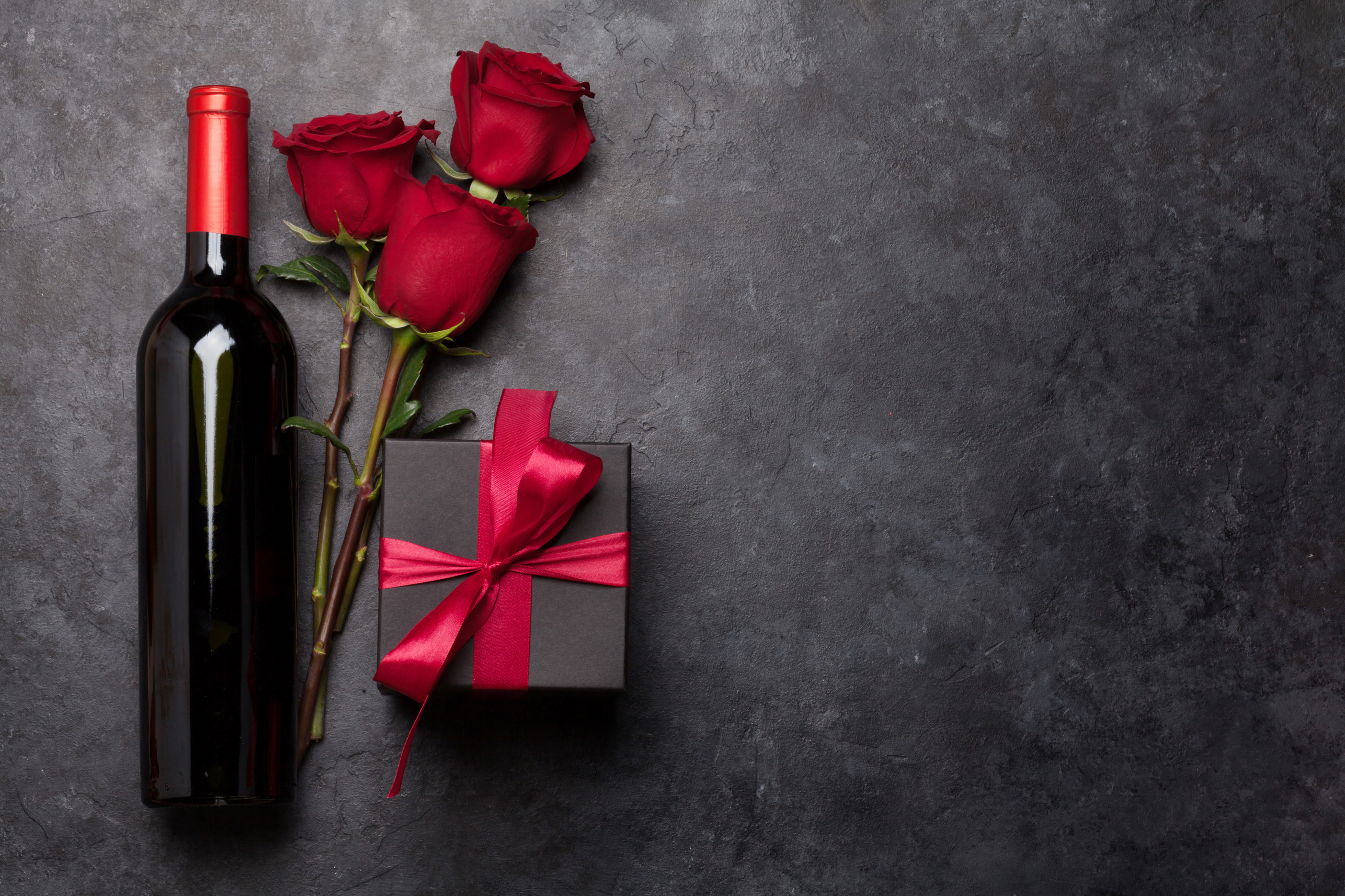 Valentines day with wine and roses bouquet